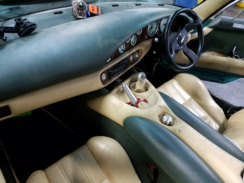 Beautiful cream and green interior (yes that is carpet on the door panels)